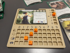 Arkham Horror player dashboard with cubes and arrows