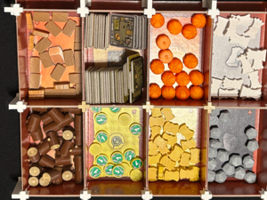 Agricola tokens (food, wood, stone, and veggie)