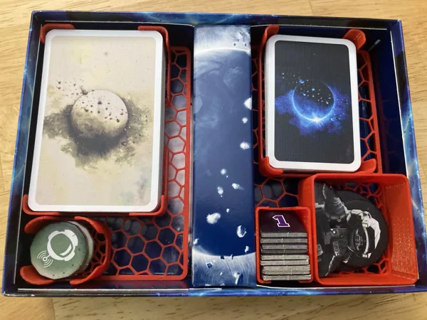 a minimalist box insert for The Crew: The Quest For Planet Nine