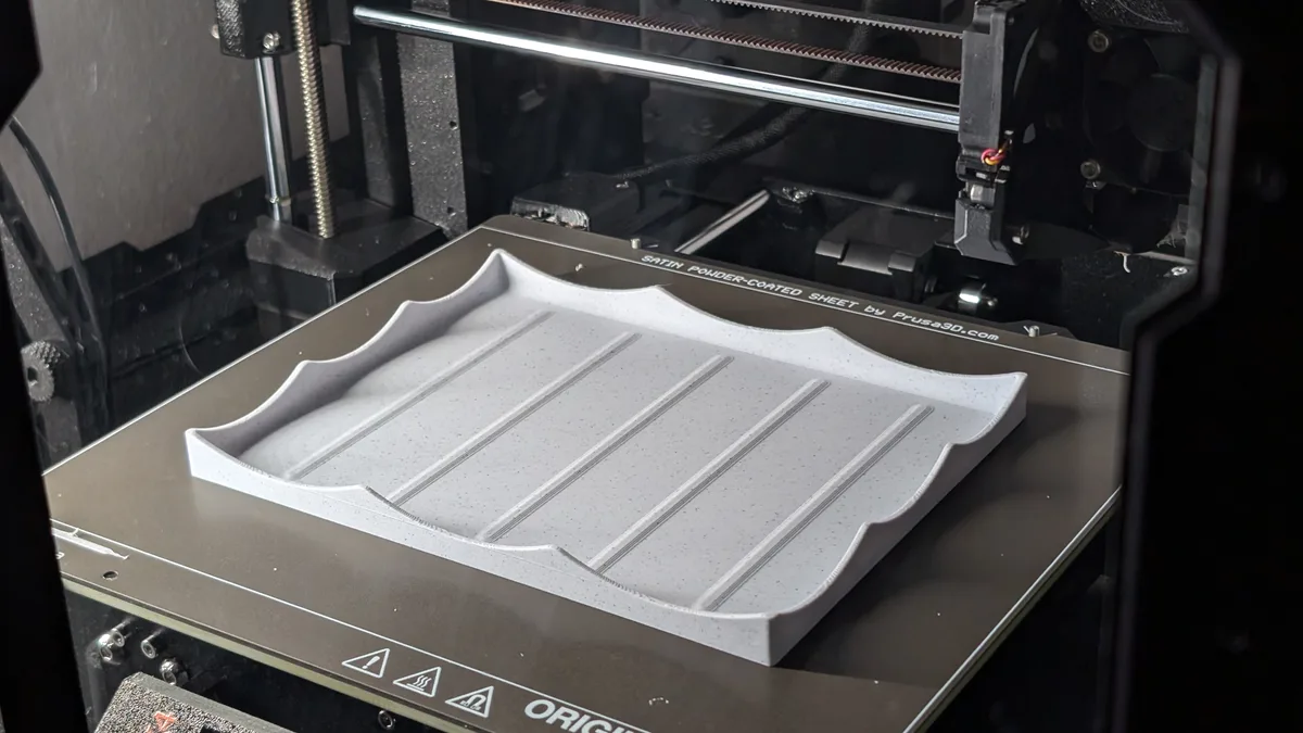 Dragon tray: Keep tools and parts from rolling