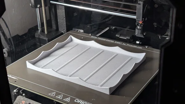 Dragon tray: Keep tools and parts from rolling