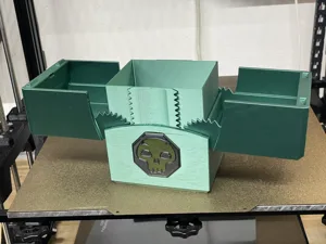 An oversized geared deck box for Planechase decks.