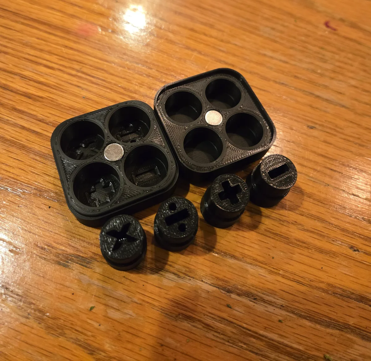 Set of four "Math Sockets" with magnetic storage box.