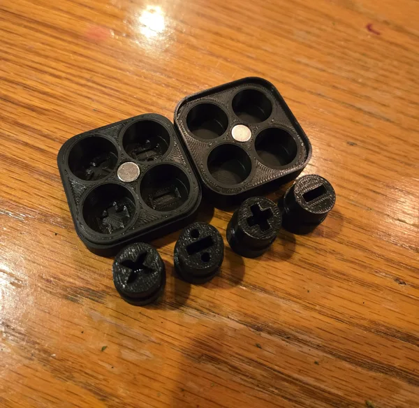 Set of four "Math Sockets" with magnetic storage box.