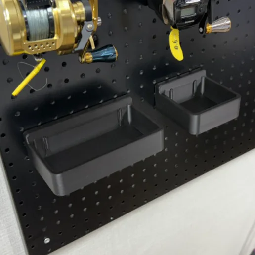 Magnetic storage box for perforated steel panels