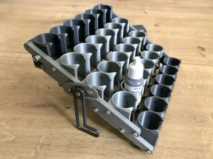 Folding paint rack for 25mm bottles.