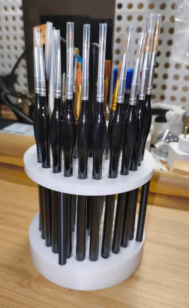 Rotating Brush Holder