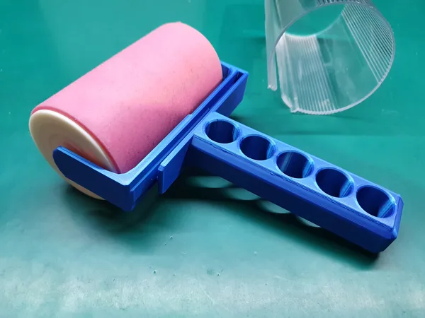 Clothing sticky lint roller/brush holder/handle