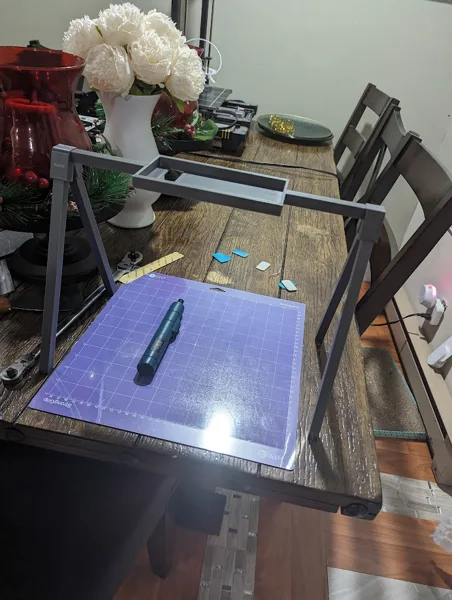 A phone holder to take pictures of something below it so its a perfect 90 degree
