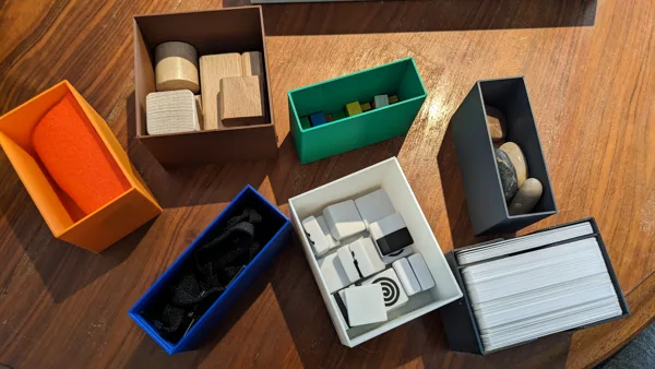 Pictures + expansion board game box insert