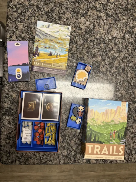 Trails insert that support sleeved cards, and wooden tokens