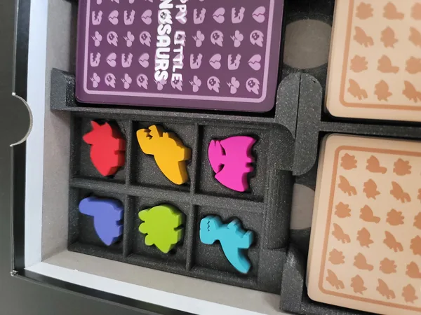 Happy Little Dinosaurs board game insert