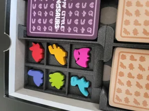 Happy Little Dinosaurs board game insert