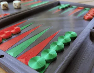 Backgammon with magnetic hinges