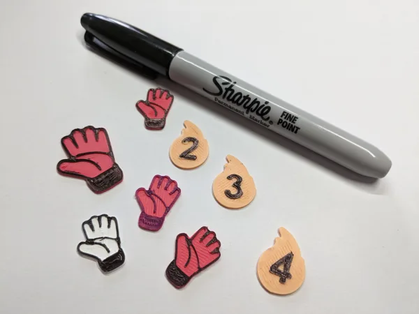 Eleven Boardgame Strength and Glove tokens