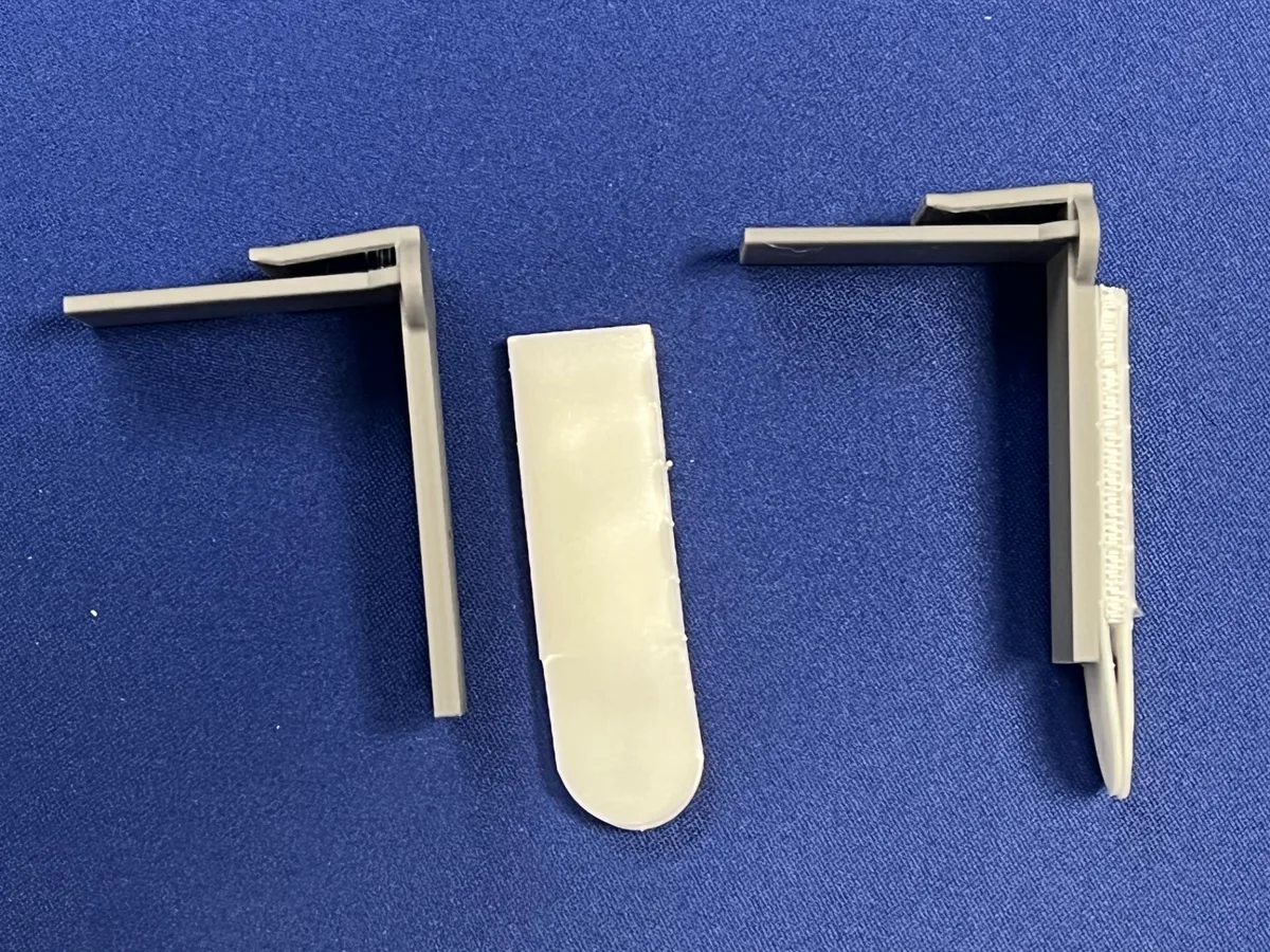 Hanger clip for empty boardgame boxes