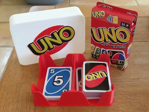 Card Game Deck Organizer and Storage Container featuring a Sample Uno Emblem