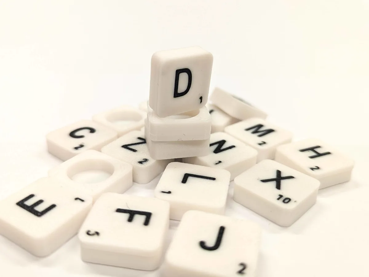 Scrabble letter tile/rock/stone - D