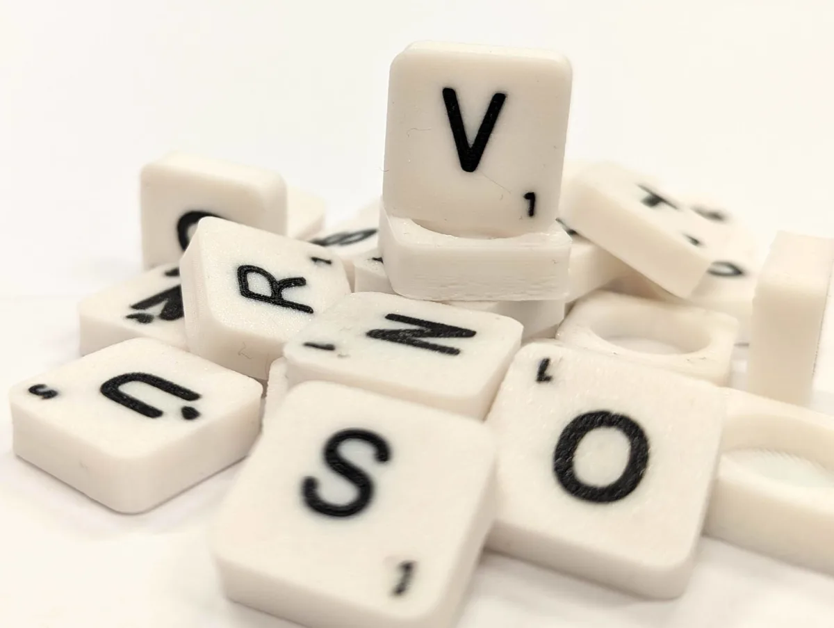 Scrabble letter tile/rock/stone - V