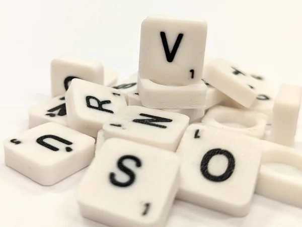 Scrabble letter tile/rock/stone - V