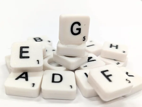 Scrabble letter tile/rock/stone - G