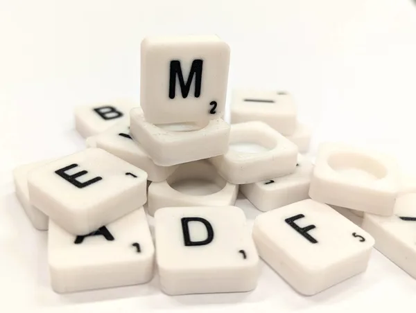 Scrabble letter tile/rock/stone - M
