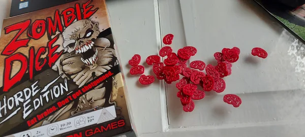 Brain token for zombie dice