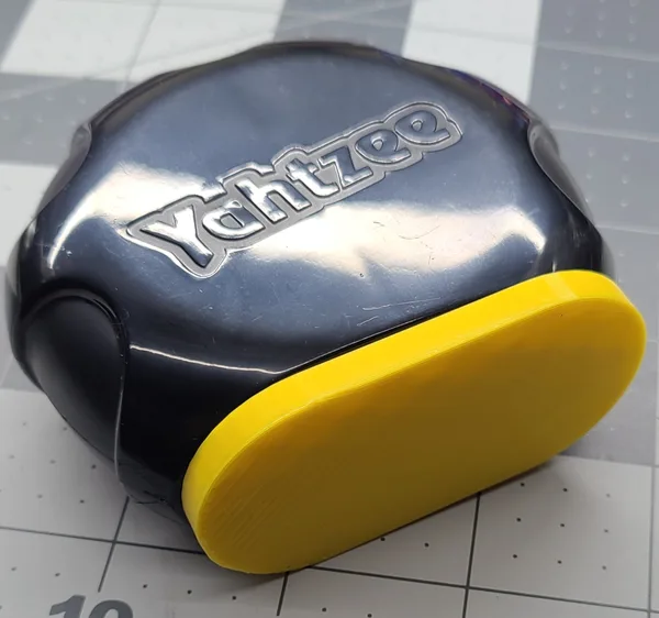 Yahtzee dice shaker plug cover