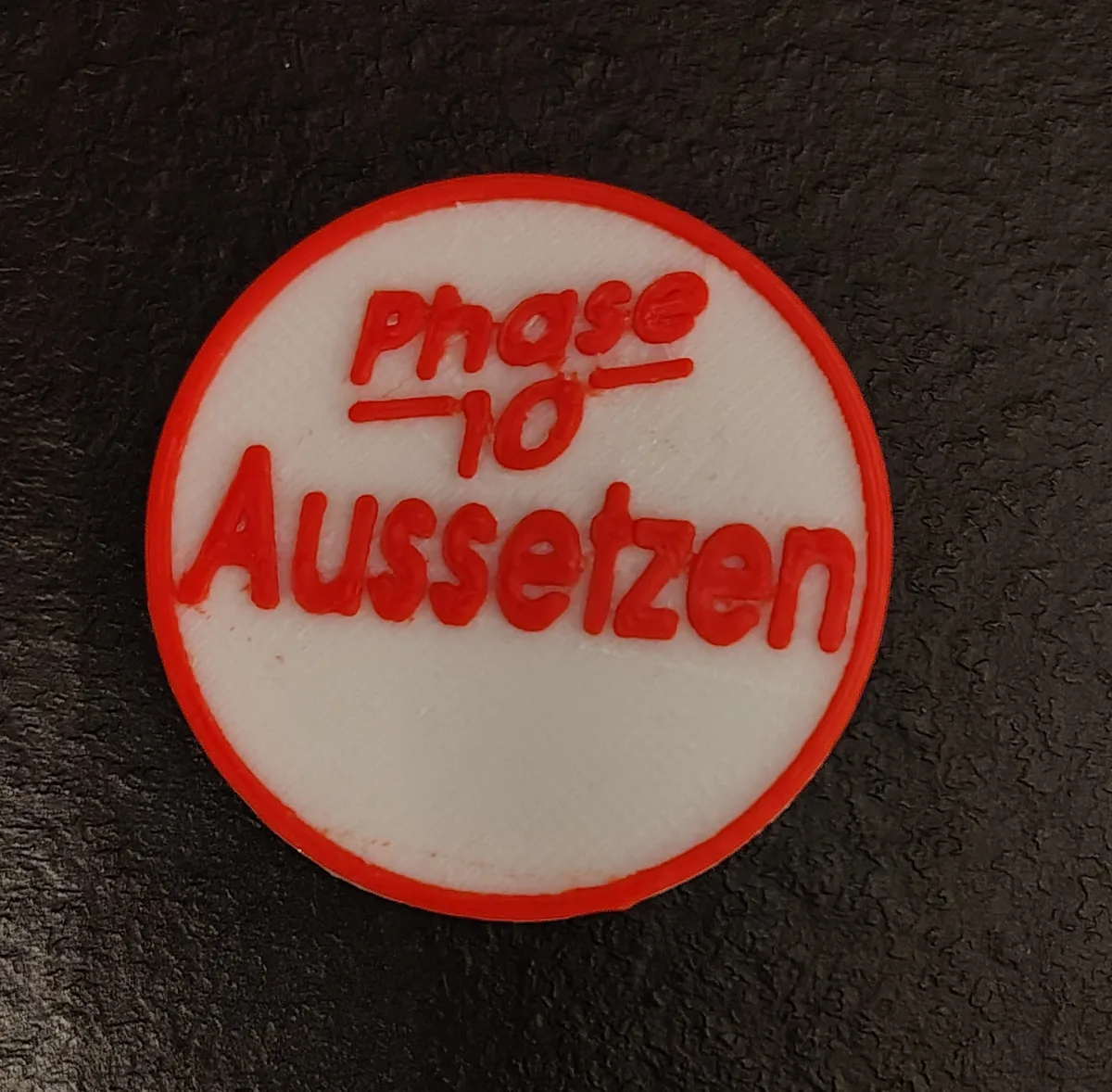 Phase 10 Aussetzen Token