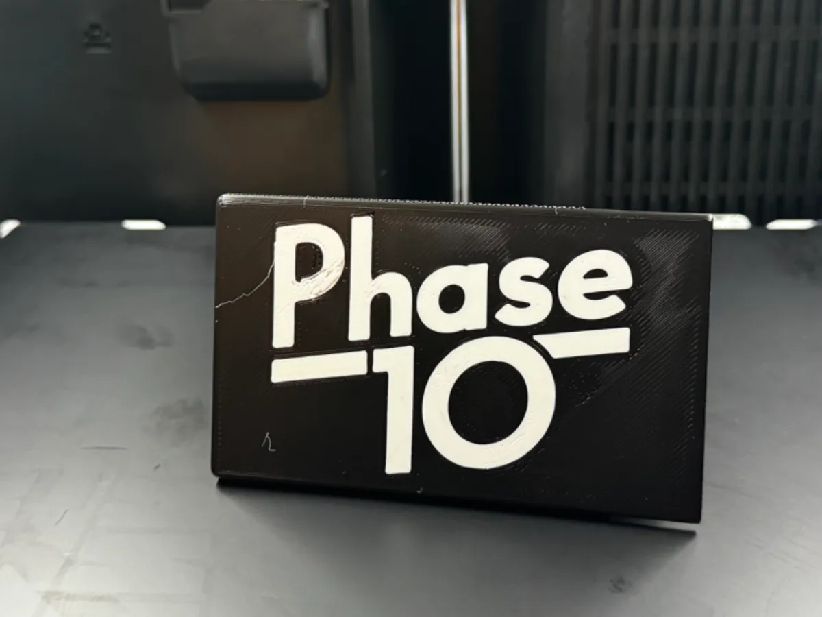 Phase 10 box with snapping slide-lid