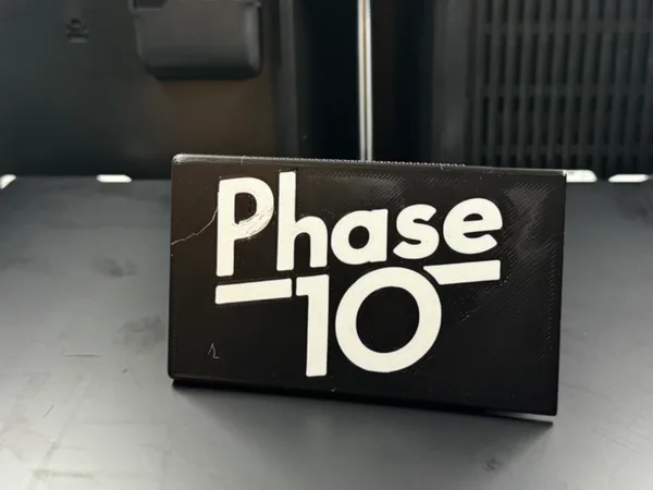 Phase 10 box with snapping slide-lid