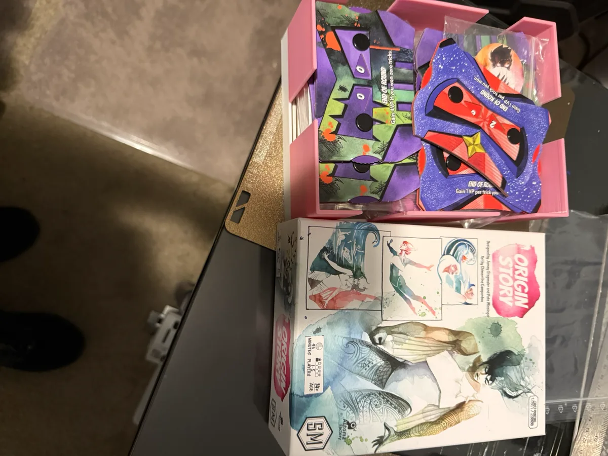 Origin Story taller base for sleeved cards