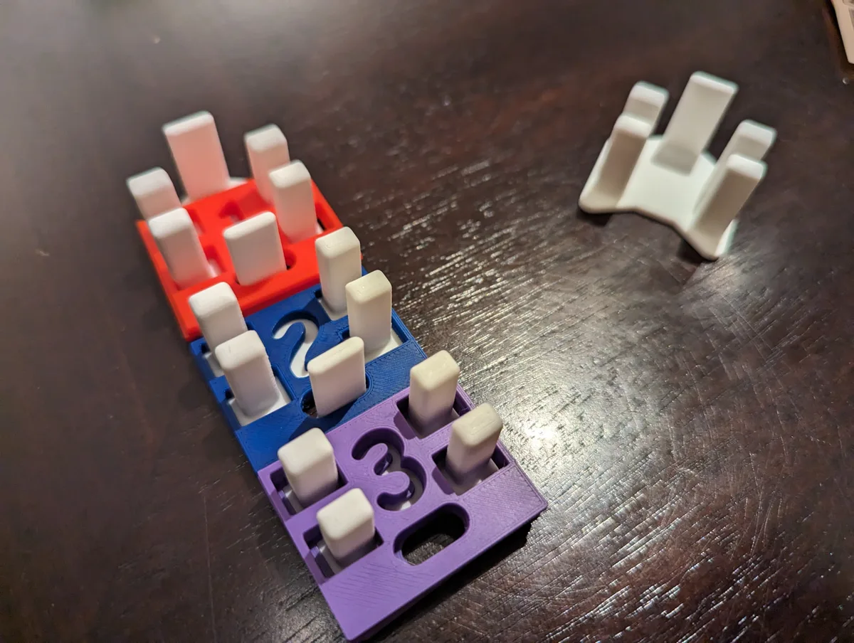 Holders for Monopoly Player Numbers