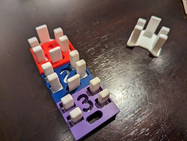 Holders for Monopoly Player Numbers