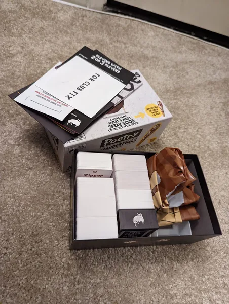 Card dispenser and insert for poetry for neanderthals board game