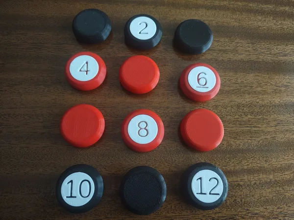 Dozen Numbered Discs (12 Chip Trick)