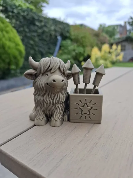 Highland Cow with Fireworks Box