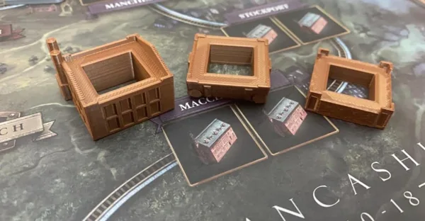 Brass board game buildings
