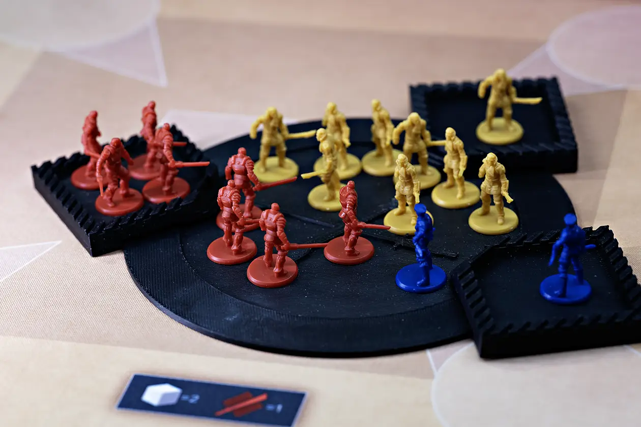Official Miniature player troops facing off in combat