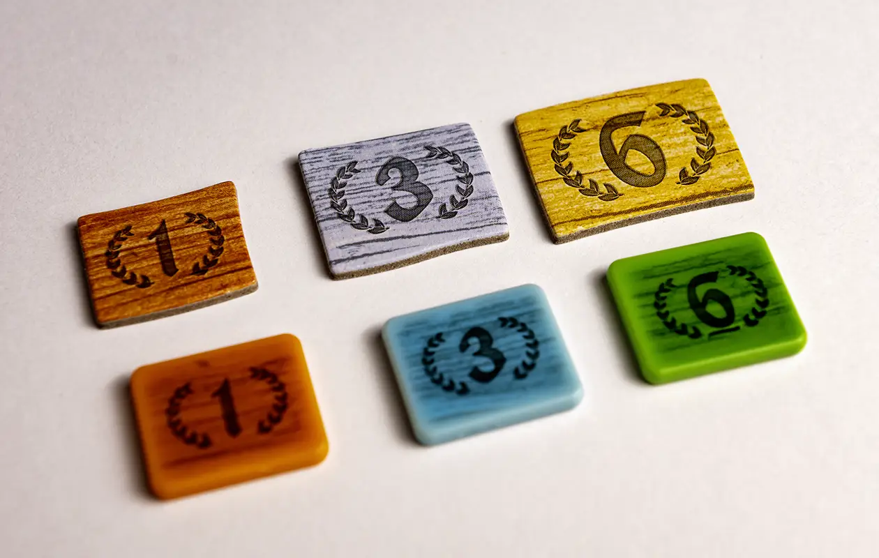 Retail (top) and Deluxe (bottom) Point Token Comparison